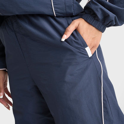 Women's DAILYSZN V2 Piped Woven Pants - Navy/Pink