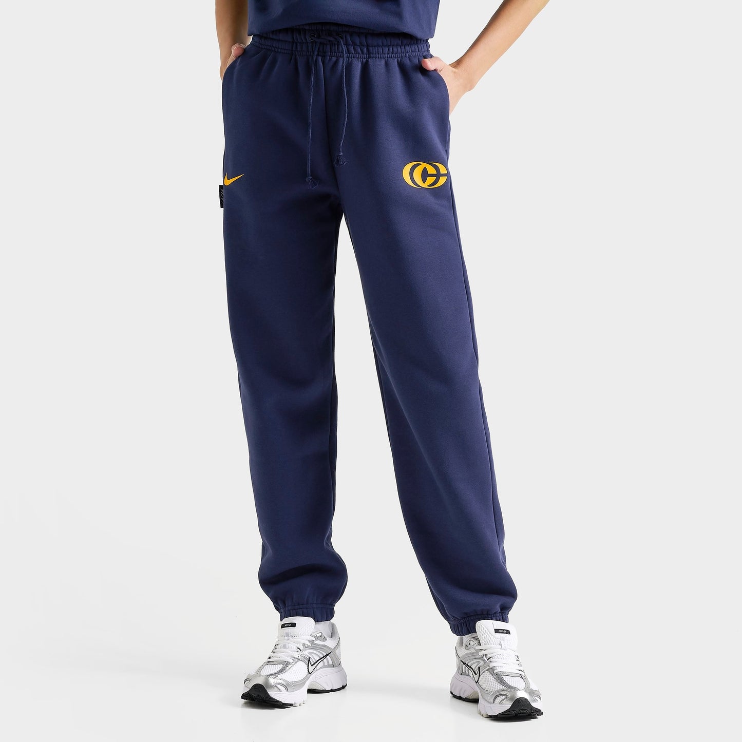 Women's Nike Caitlin Clark Essential Fleece Pants - Midnight Navy/Amarillo/Amarillo