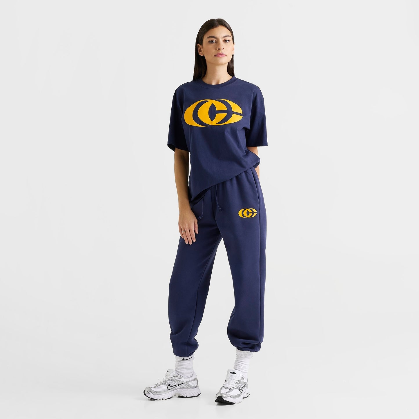 Women's Nike Caitlin Clark Essential Fleece Pants - Midnight Navy/Amarillo/Amarillo
