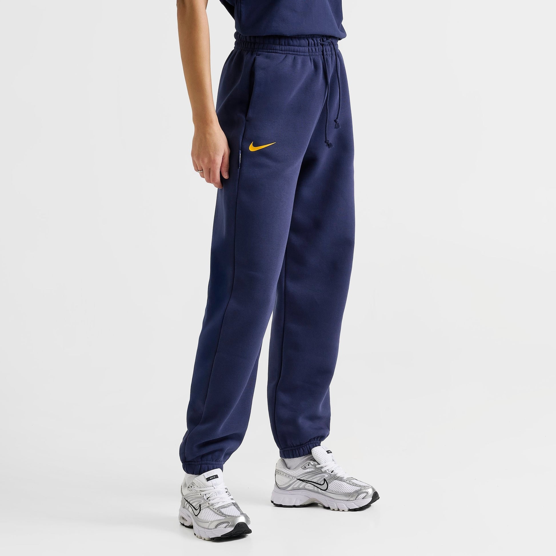 Women's Nike Caitlin Clark Essential Fleece Pants - Midnight Navy/Amarillo/Amarillo