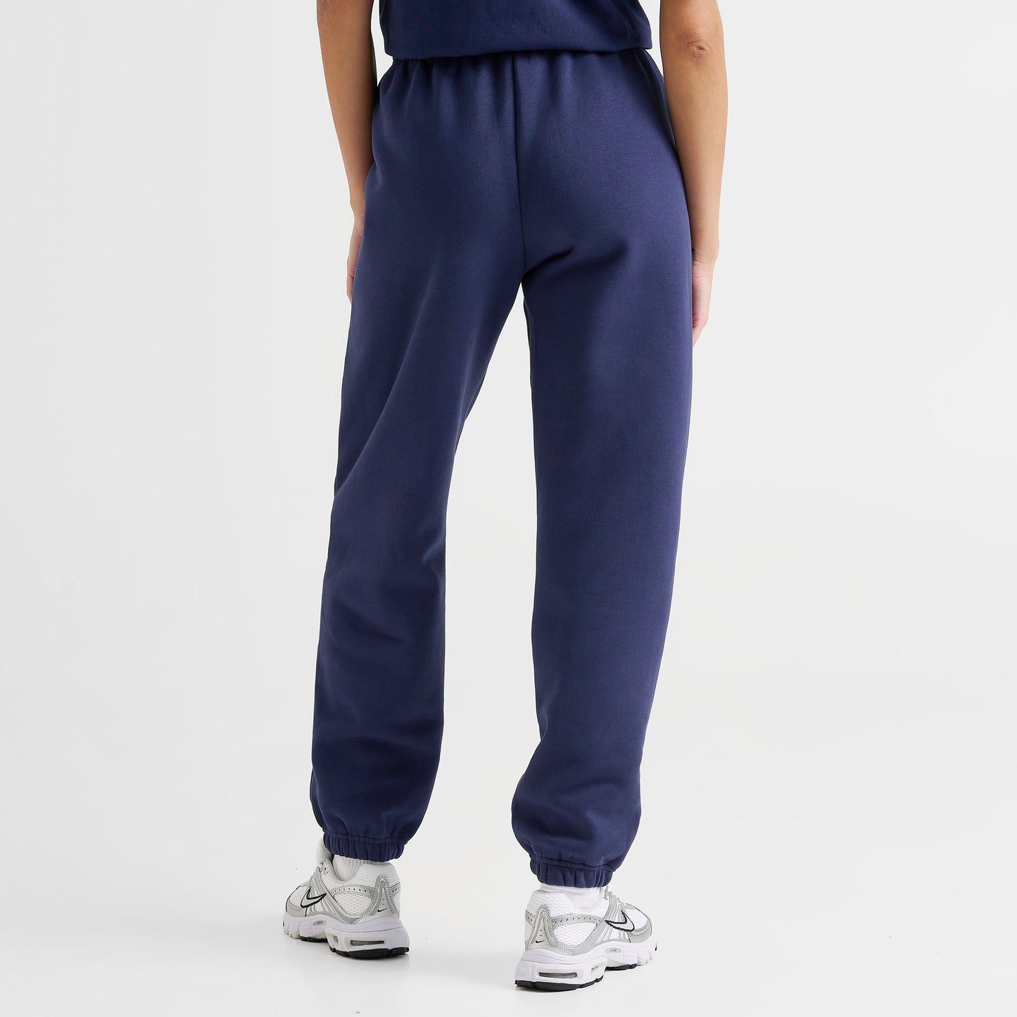 Women's Nike Caitlin Clark Essential Fleece Pants - Midnight Navy/Amarillo/Amarillo