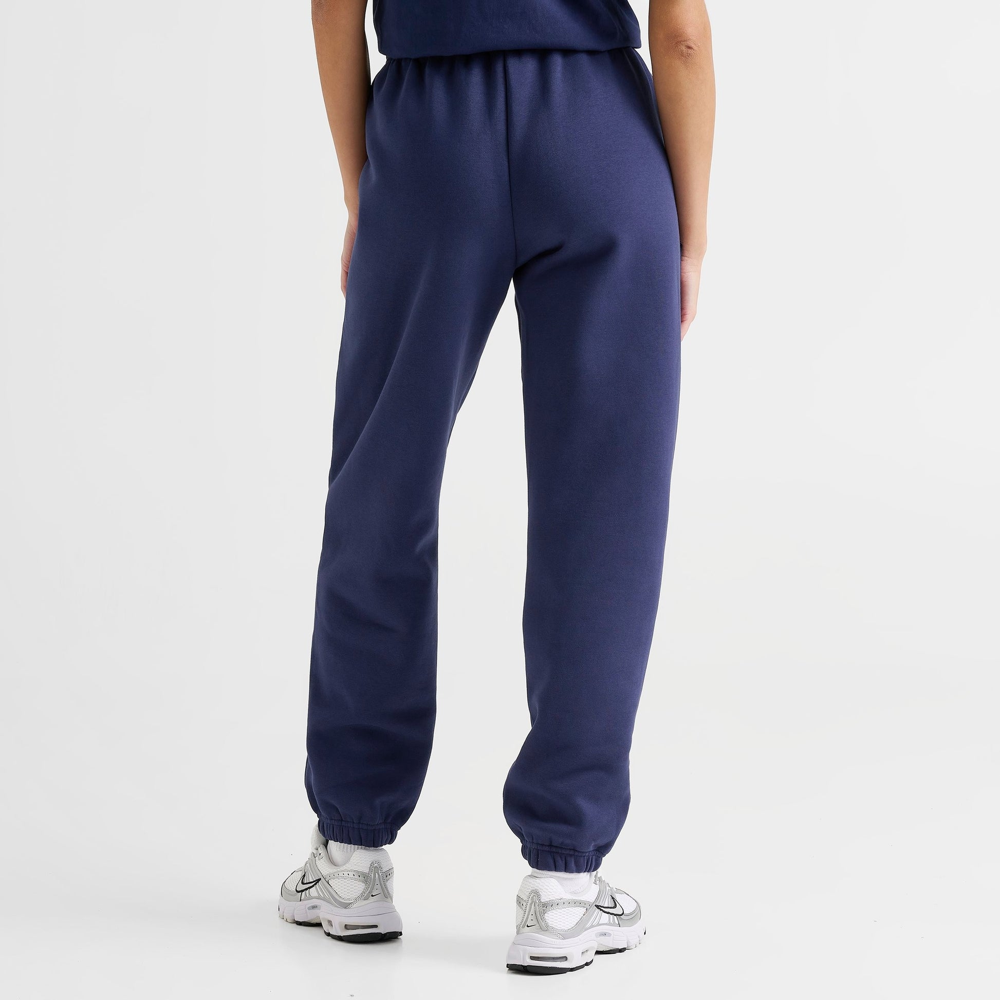 Women's Nike Caitlin Clark Essential Fleece Pants - Midnight Navy/Amarillo/Amarillo