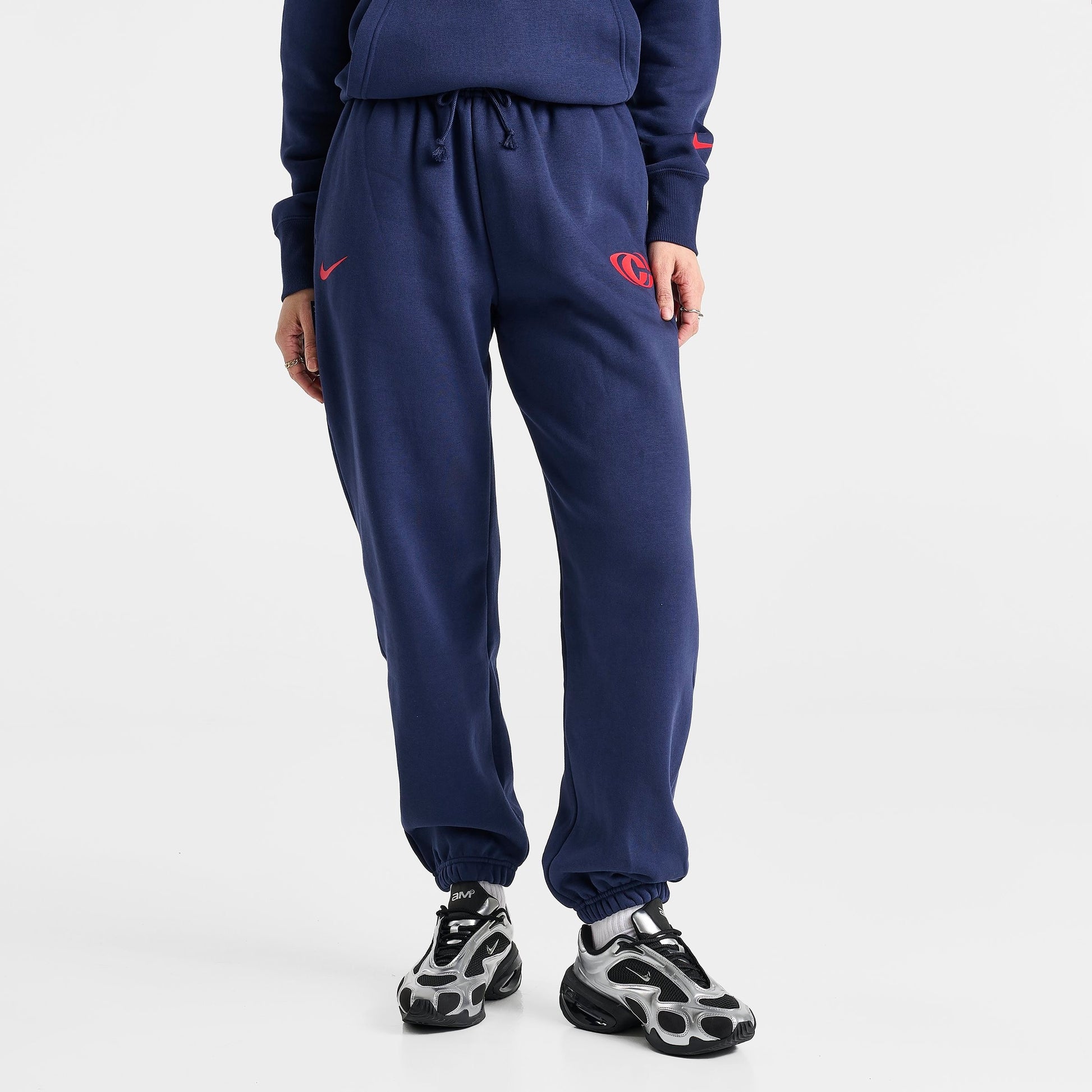 Women's Nike Caitlin Clark Essential Fleece Pants - Midnight Navy/University Red/University Red