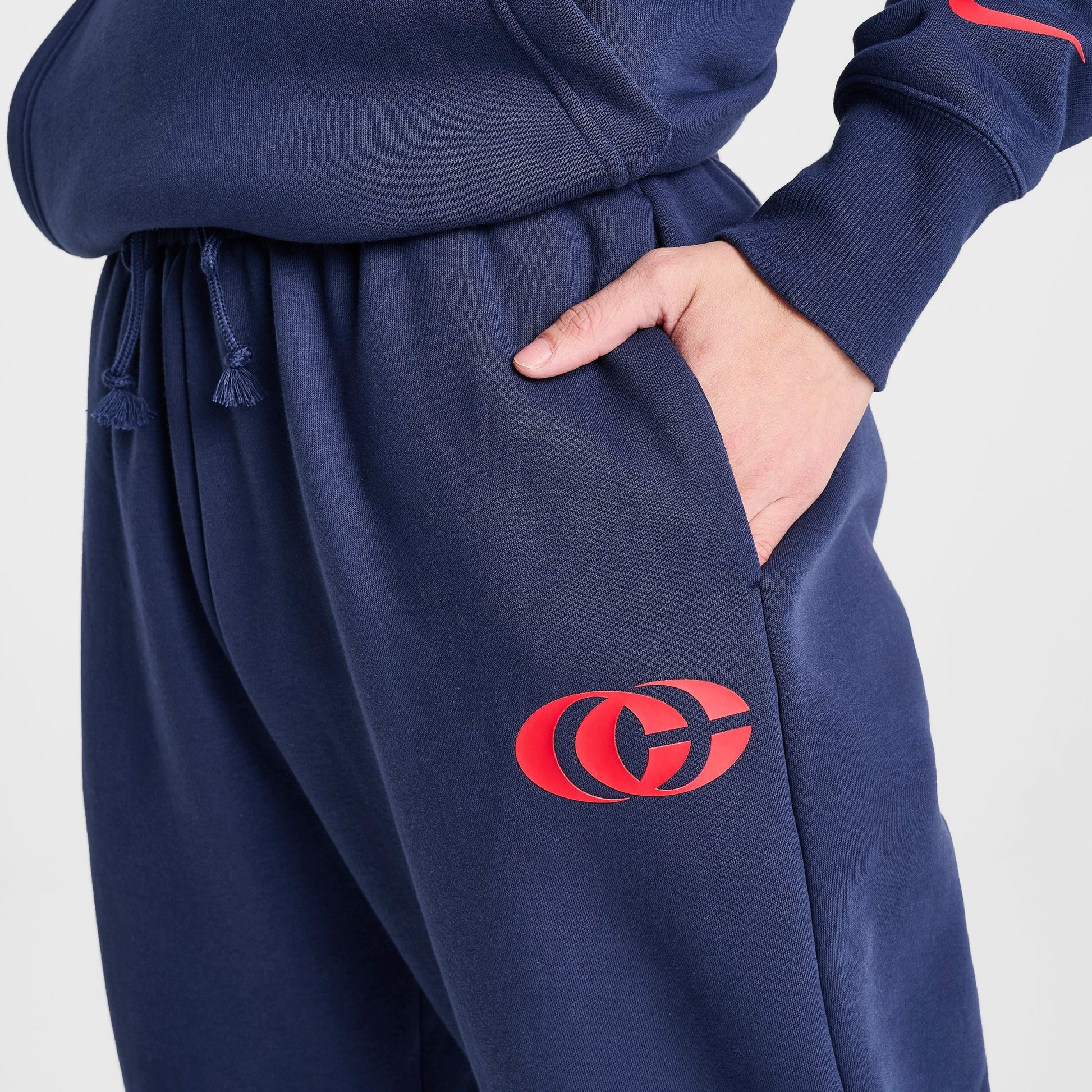 Women's Nike Caitlin Clark Essential Fleece Pants - Midnight Navy/University Red/University Red