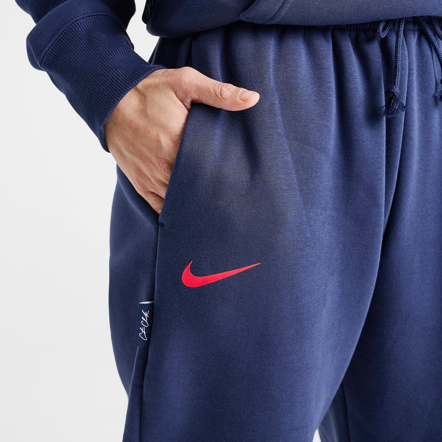 Women's Nike Caitlin Clark Essential Fleece Pants - Midnight Navy/University Red/University Red